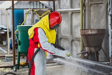 Entretien de la cabine de peinture au pistolet